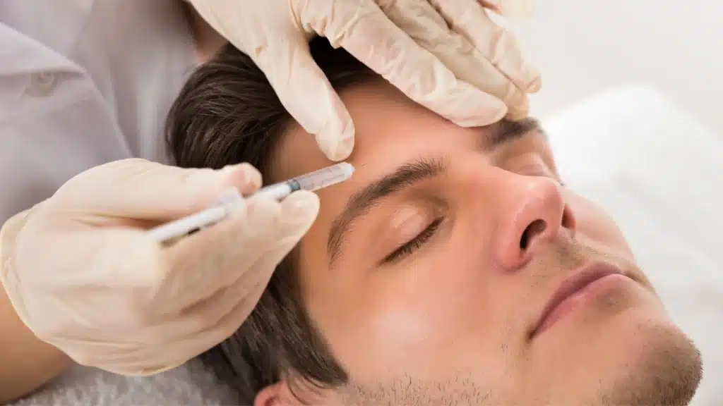 Man receiving Botox injections.
