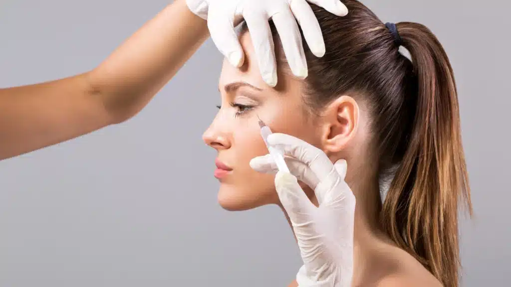 woman at med spa receiving botox injections.